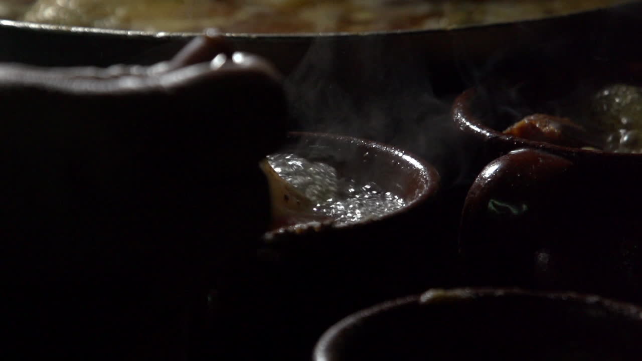 Slow Motion Boiling of Cocido madrileño, traditional chickpea-based stew from Madrid, Spain