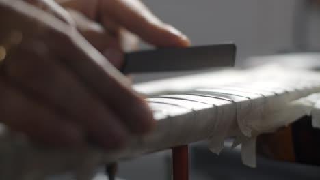 repairing a musical instrument