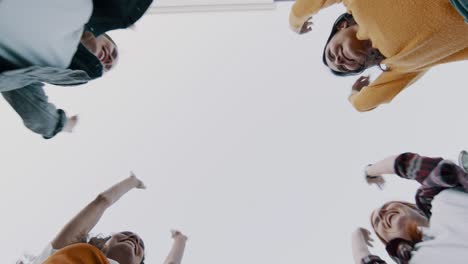 female friends stacking hands