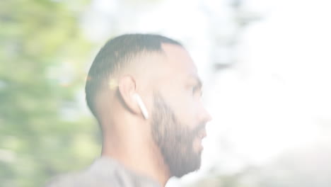 Runner-man,-speed-and-earpods-in-park