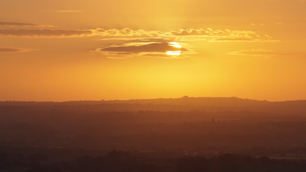 Close up shot of the sunrise taken from a drone high in the sky