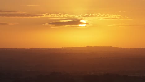 close up shot of the sunrise taken from a drone high in the sky
