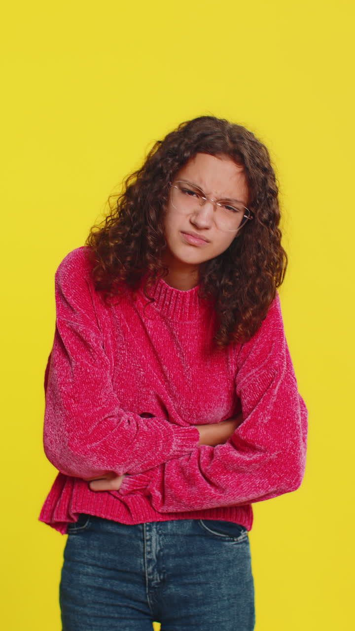 Sick ill teenager child girl kid suffering from period cramps stomach ache menstrual pain gastritis