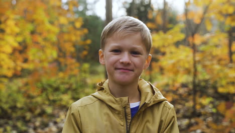 blond kid in the forest