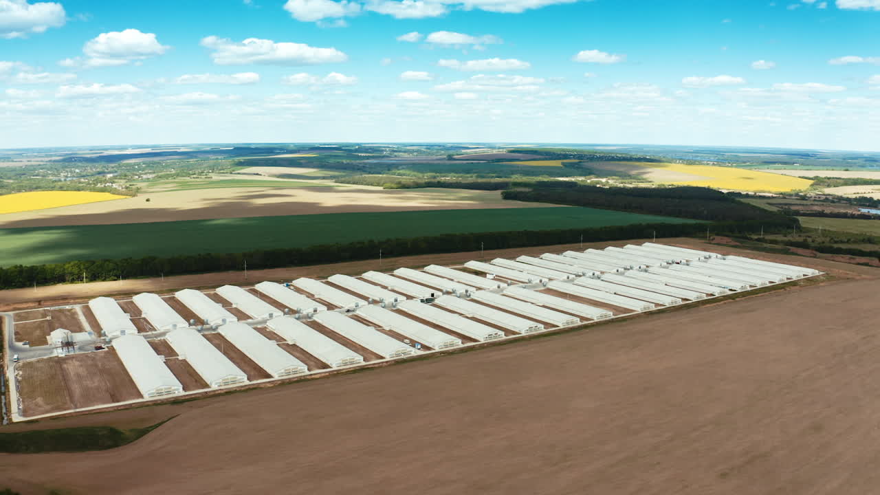 Aerial shot of chicken farms. Agriculture industry in countryside from above