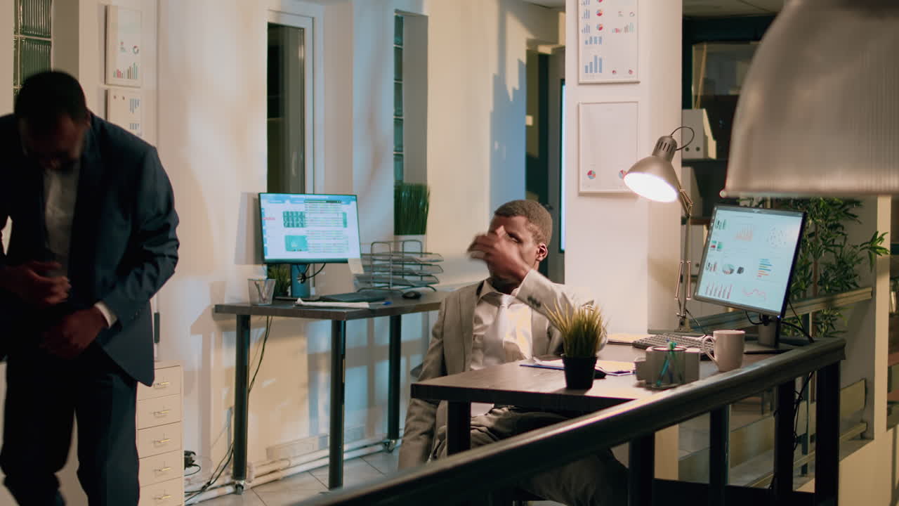 Two businessmen at the office