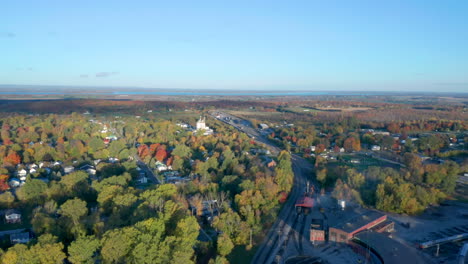 Flying-over-St.-Albans,-Vermont-during-Fall