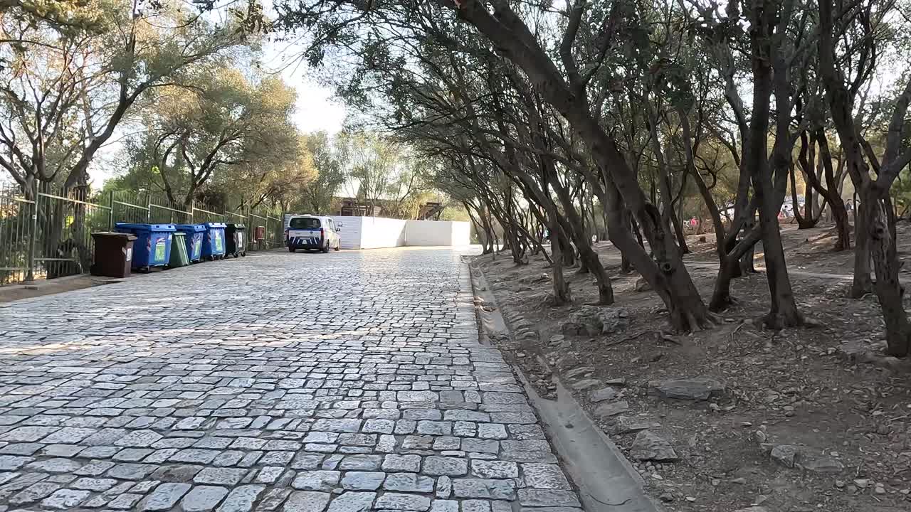 Walking towards the Acropolis of Athens.