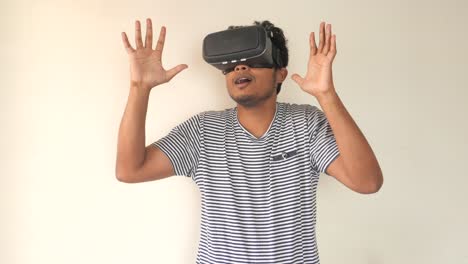 young man experiencing virtual reality