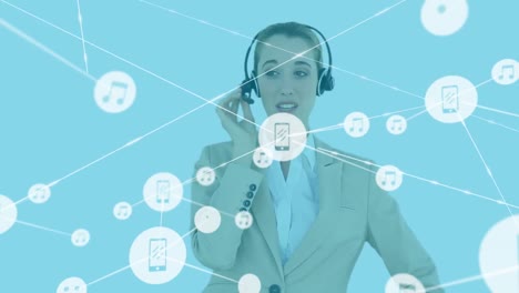 Animation-of-network-of-connections-with-icons-over-caucasian-woman-working-in-call-center