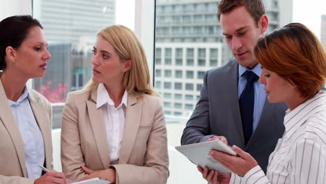 business people standing and talking