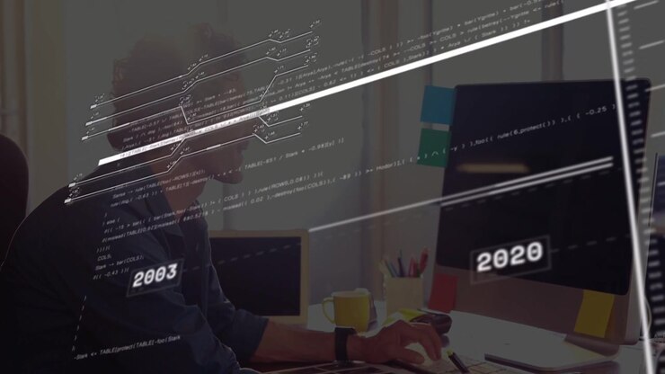 Man at desk reacting to animated timeline appearing using tablet and stylus for digital design