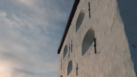 a old building wall of an fortress with beautiful sunny scenery in the background