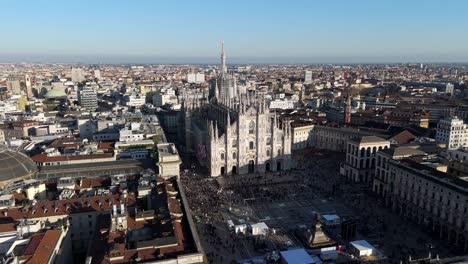 duomo milan main square cathedral aerial drone fly above revealing cityscape