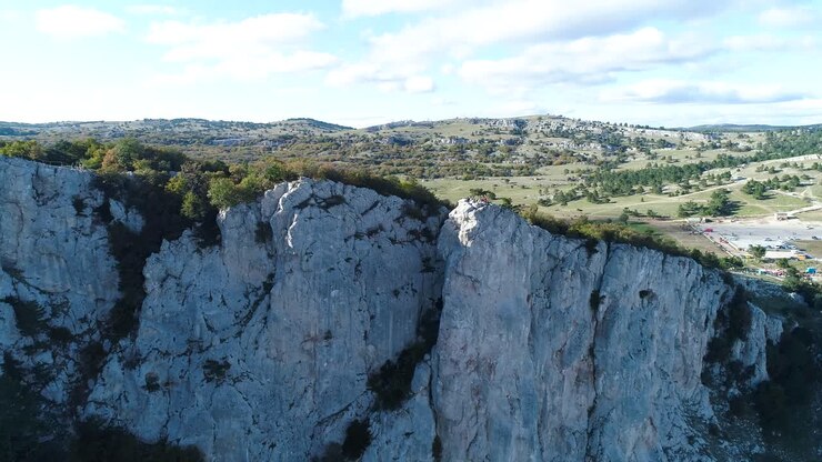 Mountainous Landscape with Cliffs and Valley View
