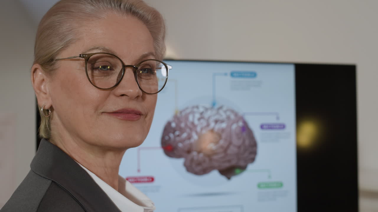 Businesswoman presenting brain diagram