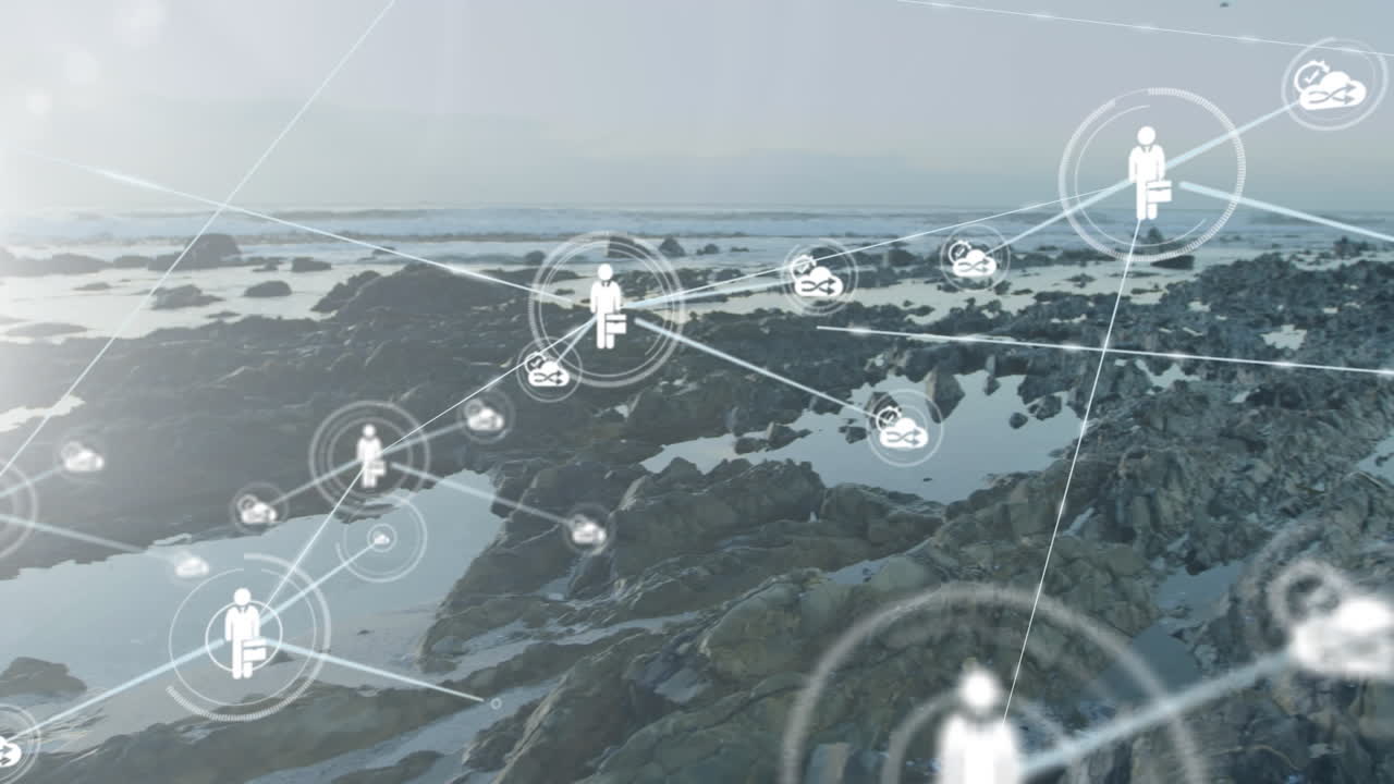 анимация соединенных икон над скалами на берегу моря на фоне облачного неба