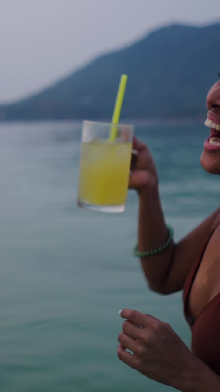 People enjoying cocktails on the beach