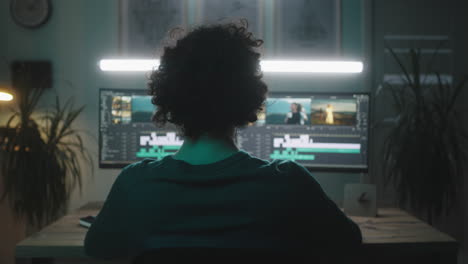 person editing video at night