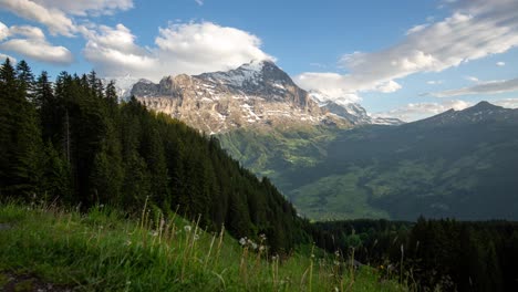 timelapse of dynamic cumulus clouds moving over the eiger in switzerland