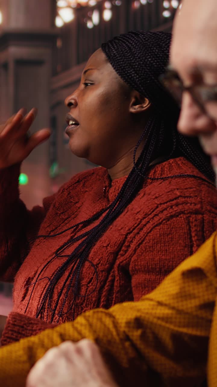 Vertical Video Diverse actors practicing theatre script with deep dedication in a library