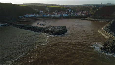 establishing drone shot approaching staithes coastal village yorkshire