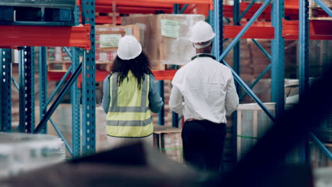 warehouse workers inspecting inventory