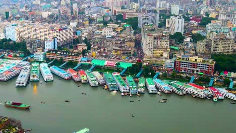 aerial view of ships at the largest sadarghat boat terminal in buriganga river, dhaka, bangladesh