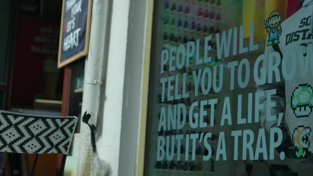 Text on a window of a store in Portugal,