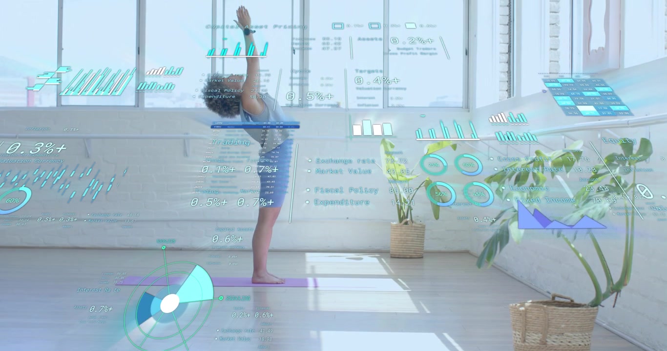 Yogi following on-screen prompts in health tech, lifting arms then backbending with live analytics