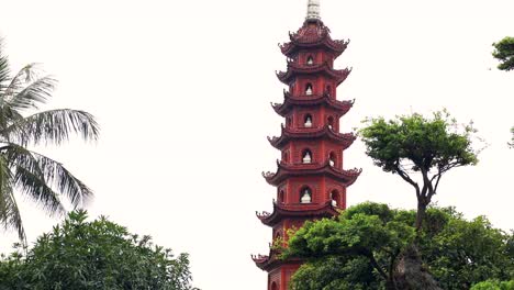 pagoda surrounded by trees in hanoi, vietnam