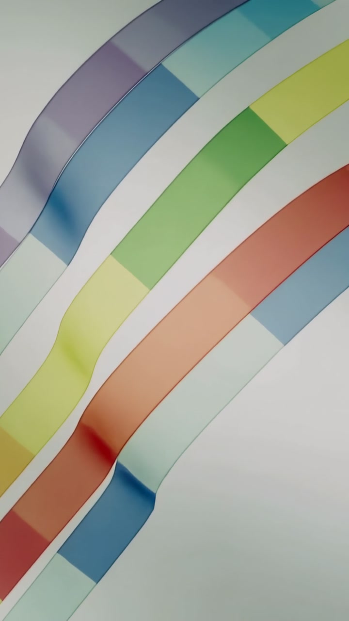 Vertical video: Pressing play, four color-block bands bending on pale background, showing motion