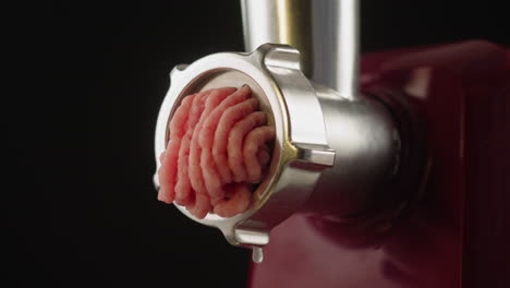 minced meat in a meat grinder