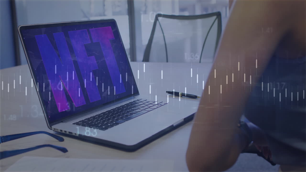 NFT text animation over laptop screen with financial data charts in office