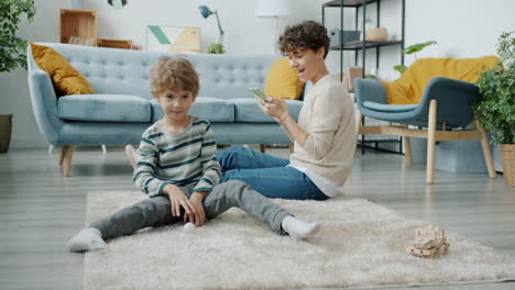 mother and child playing together at home