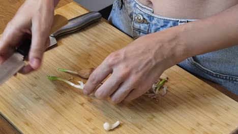 peeling garlic