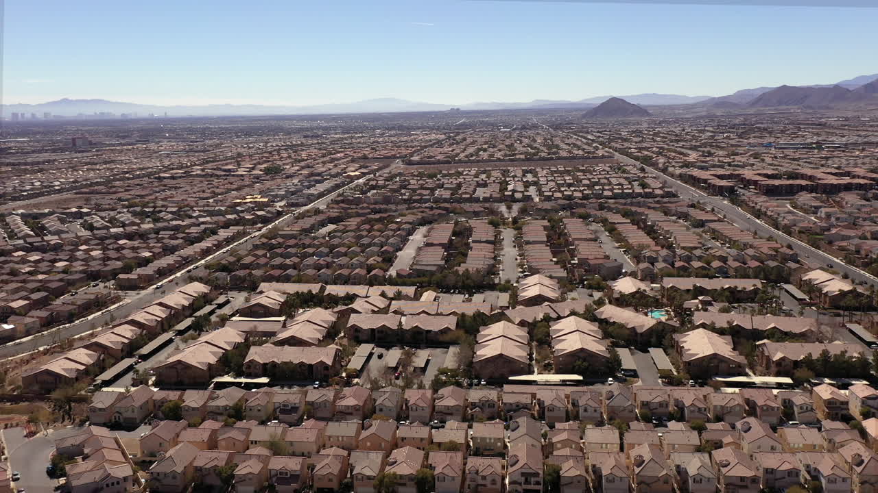 Crowded homes in Las Vegas Nevada USA. Population growth concept. Aerial drone forward