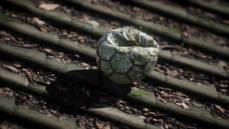 old soccer ball on the roof of a house