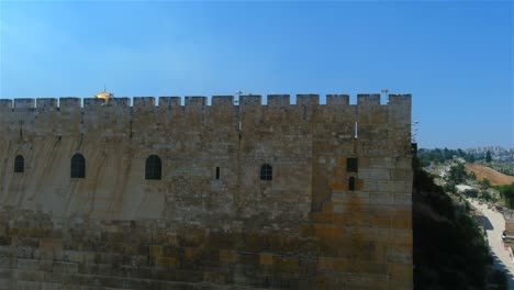 old city of jerusalem walls and dome of the rock, aerial view