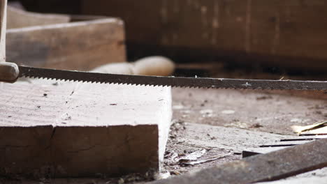 dusty old fashion working tools in old workbench in close up pan view