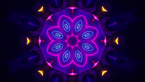 flor azul y púrpura con centro verde sobre fondo negro. ciclo de kaleidoscopio vj
