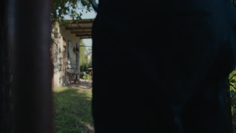 man walking in a garden