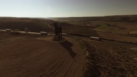 aerial shot of highway in spain, cars and trucks driving by