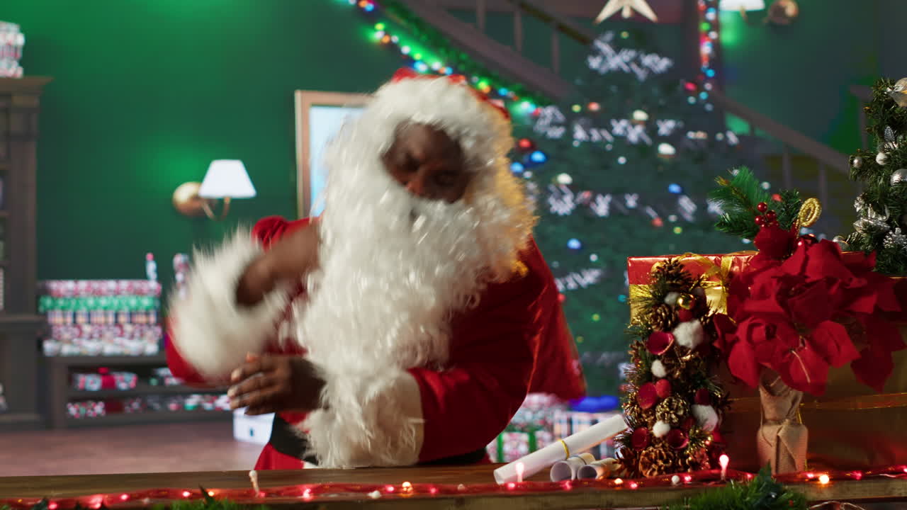 Santa Claus preparing gifts for Christmas