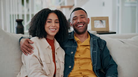 happy couple embracing on a couch