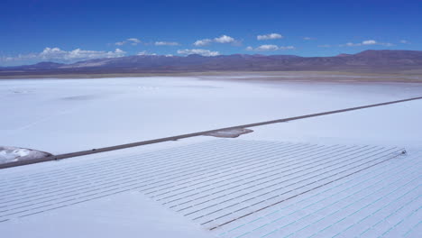 aerial pull-out of rows of extracted salt at jujuy, salinas grandes