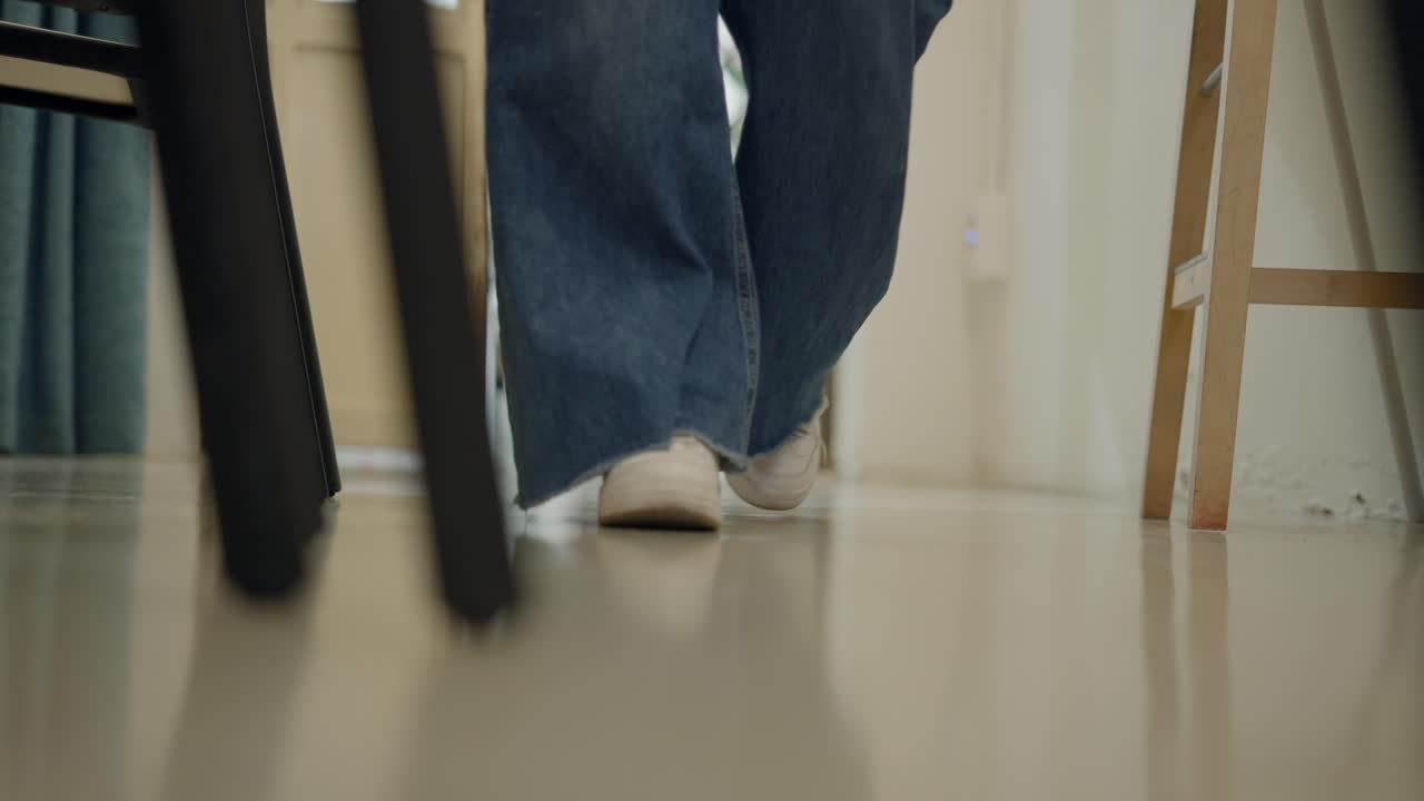 Person walking in a room