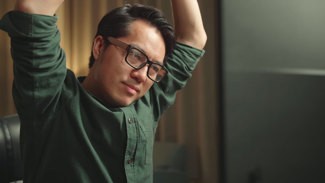 Close Up Asian Man Stretching While Works On Personal Computer And 3D Printer In Home Office, He Works At Night