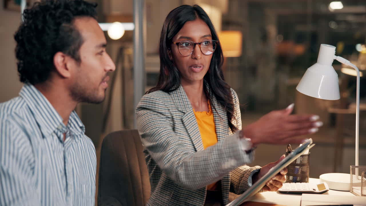 Business Colleagues Discussing Project on Tablet in Modern Office