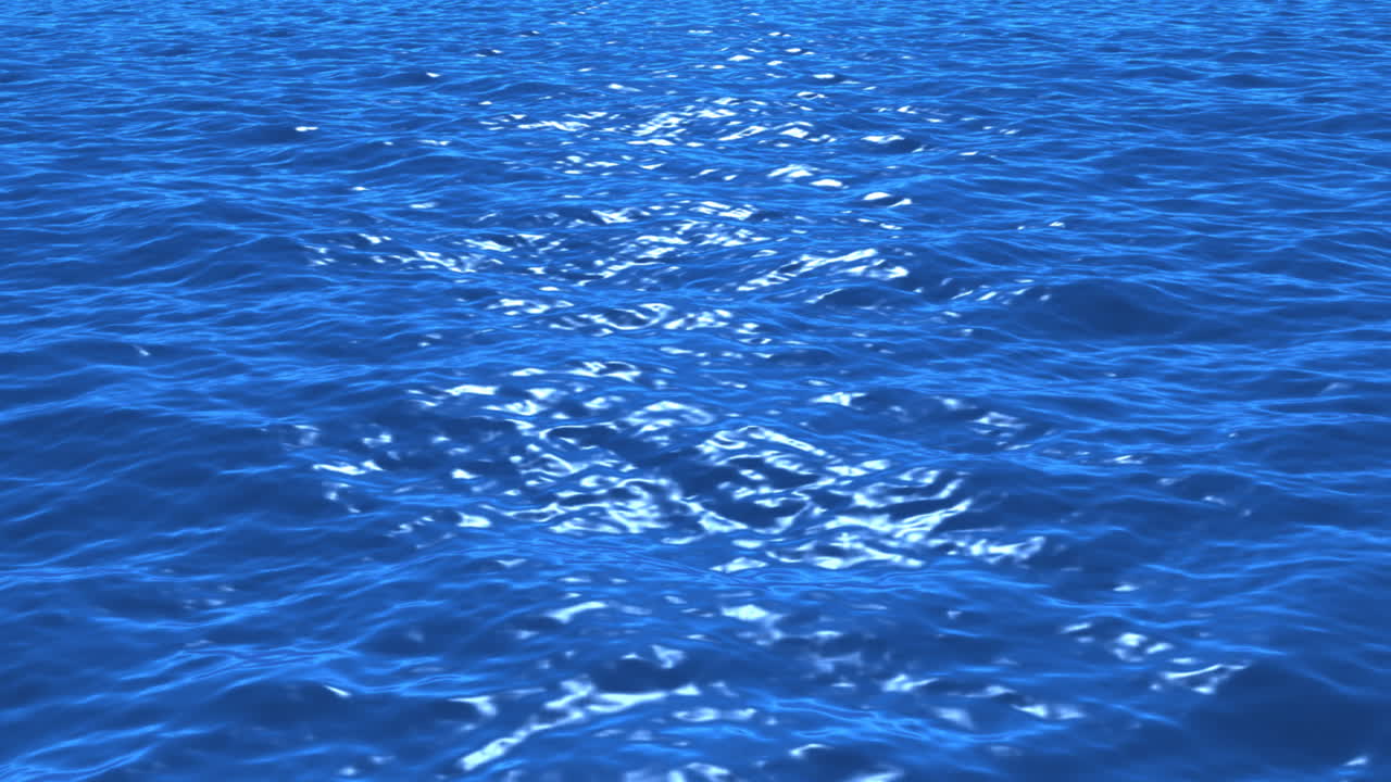 太陽光 の 反射 を 受け て 振動 し て いる 青い 水面